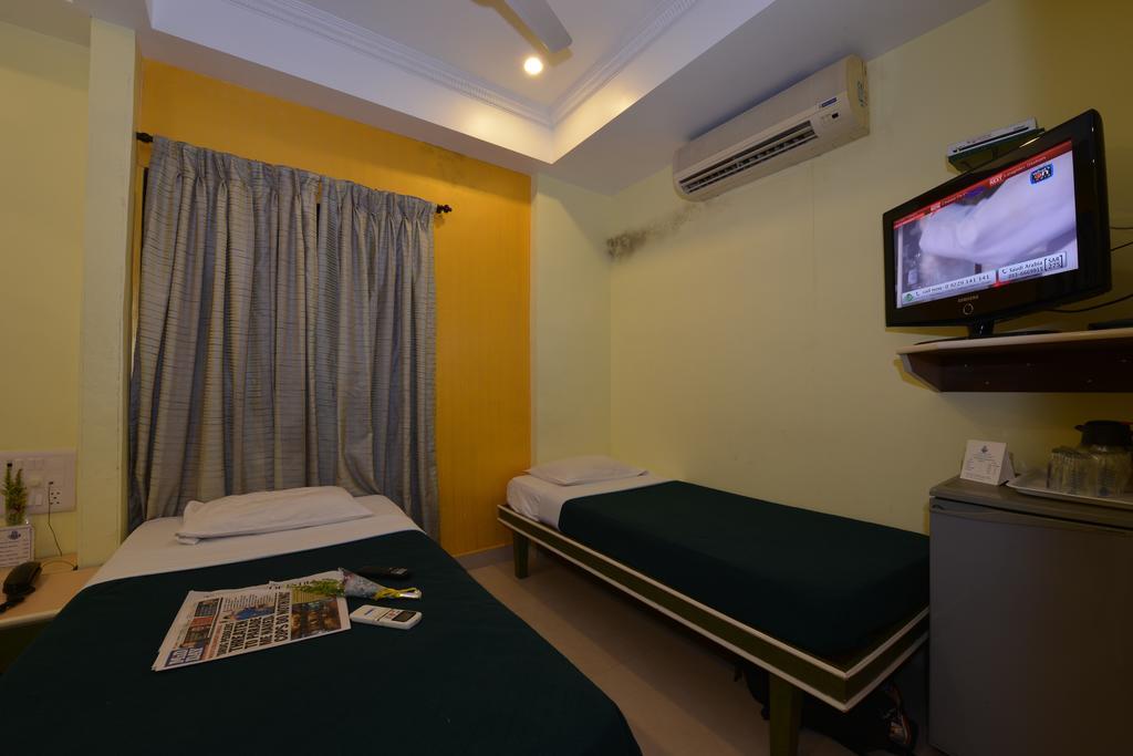 Hotel City Palace Bombaim Quarto foto
